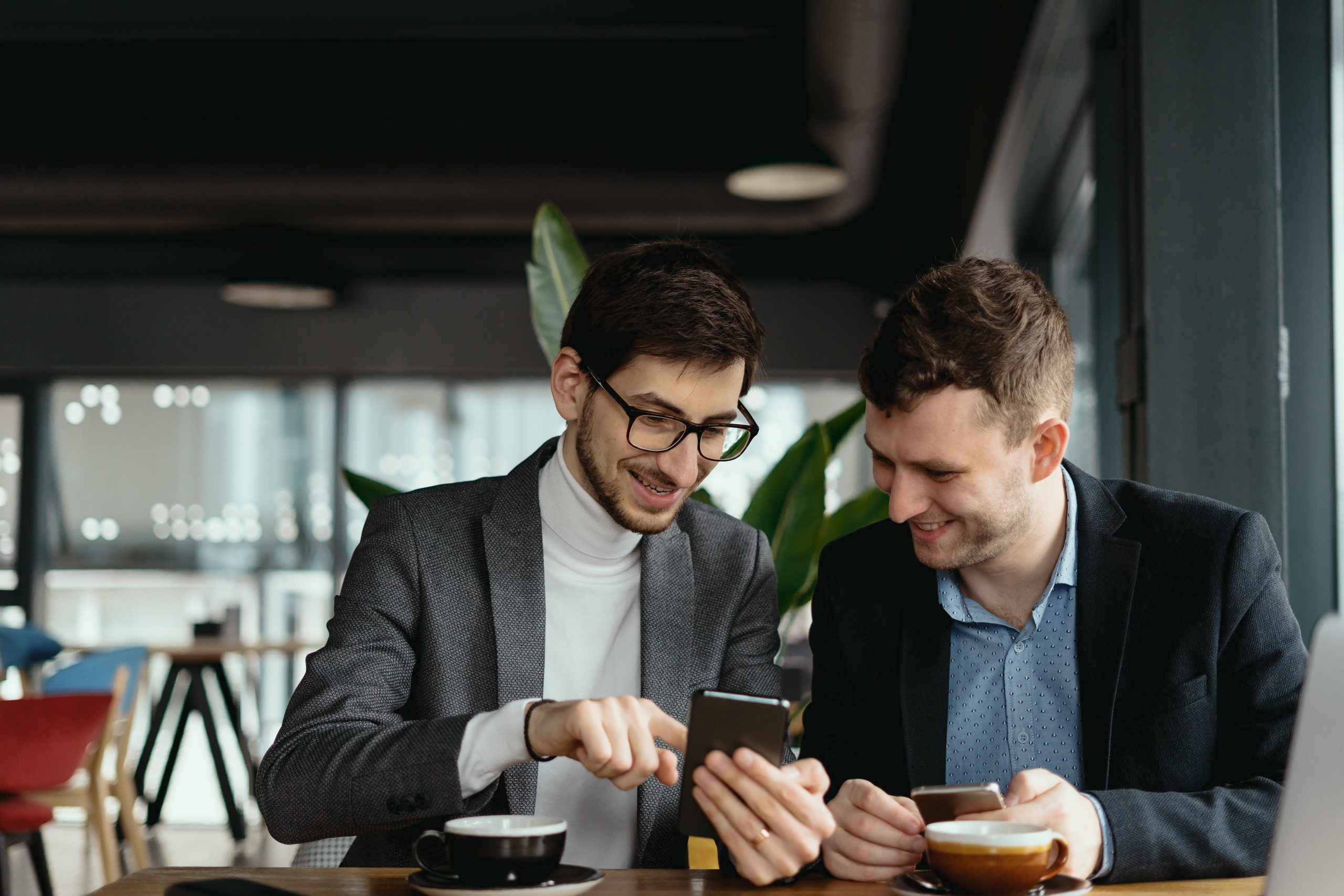 Business professionals using a mobile app to streamline operations